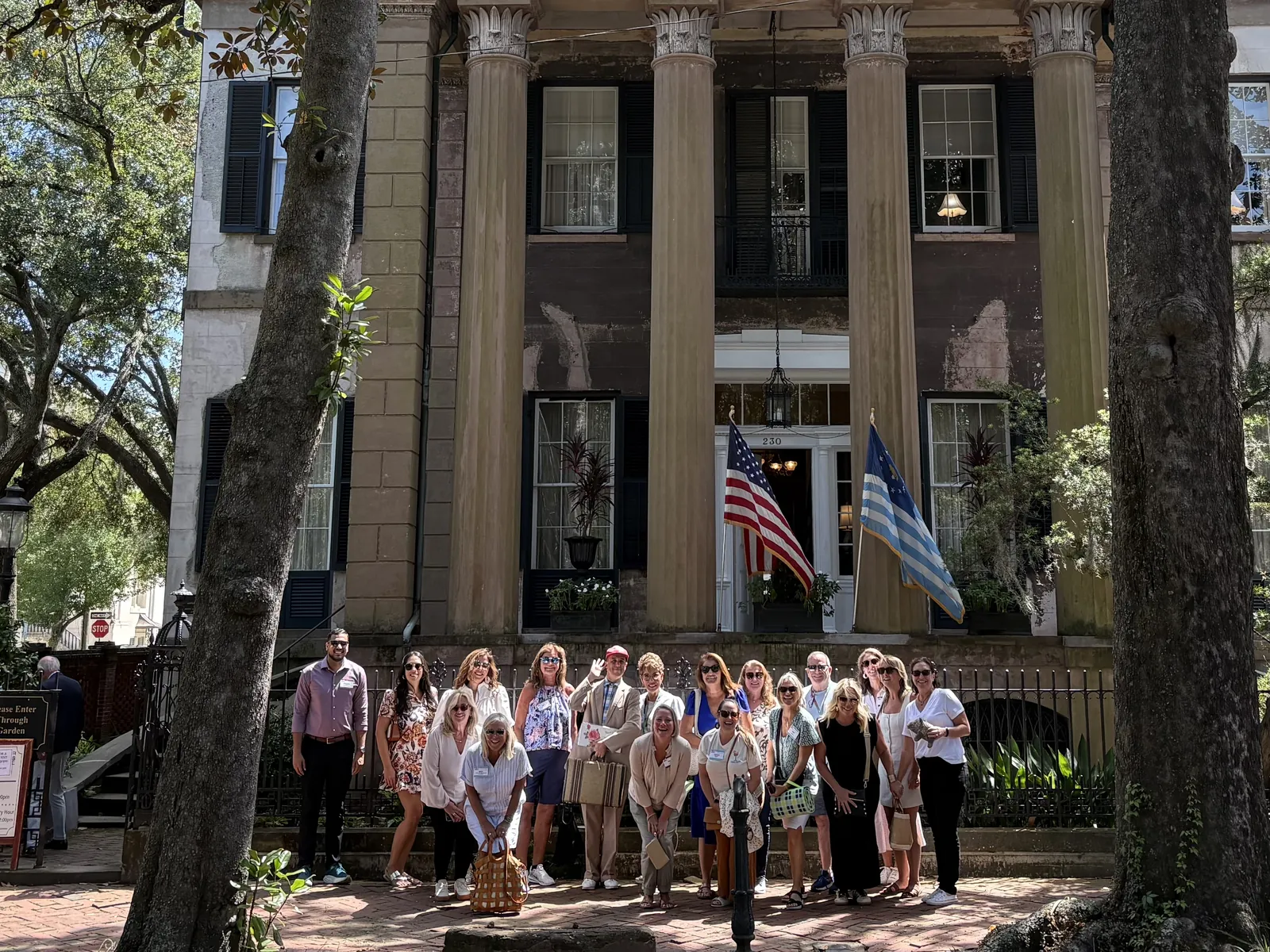 Get Gumped performer posing with a group at a Savannah event